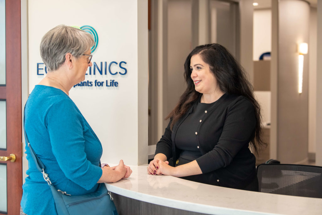 Woman attending free dental implants consultation at EON Clinics Oak Brook